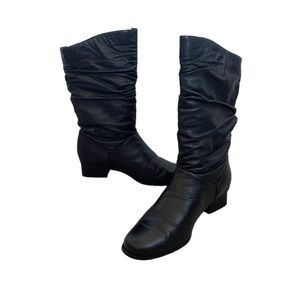 These boots have never been worn and are in original box Black leather.